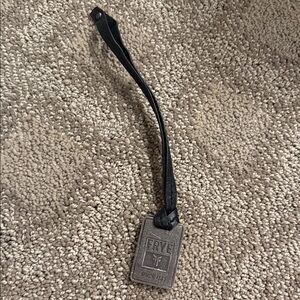 Frye metal and leather tie keychain black and silver